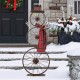 Glitzhome 33.98"H Metal Bike Wheel Snowman with Plaid Scarf Porch Decor