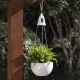 Glitzhome 30"H Solar Lighted White Plastic Hanging Planter