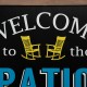 Glitzhome 29.75"H "Welcome to the Patio" Wood Framed Easel Porch Sign