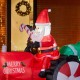 Glitzhome 11 ft Lighted Inflatable Santa on Tractor Décor