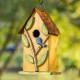 Glitzhome 9.75"H Washed Yellow Distressed Solid Wood Birdhouse with 3D Tree and Bird