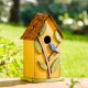 Glitzhome 9.75"H Washed Yellow Distressed Solid Wood Birdhouse with 3D Tree and Bird