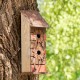 Glitzhome 14.5"H Brown/Red Pallets Two-Tiered Distressed Solid Wood Birdhouse with 3D Rustic Flowers