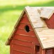 Glitzhome 14.25"L Oversized Retro Red Distressed Solid Wood Cottage Birdhouse with Natural Wood Roof