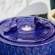 Glitzhome 14.75"D Cobalt Blue Two Birds Embossed Leaf Pattern Cylindrical Ceramic Fountain with Pump and LED Light