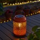 Glitzhome 8.75"H Orange Metal Cutout Solar Powered Outdoor Hanging Lantern