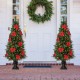 Glitzhome 2PK 5ft Pre-Lit Pine Artificial Christmas Porch Tree with 150 Warm White Lights, Poinsettia and Red Berries