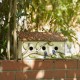 Glitzhome 15.75"L Oversized Washed White Distressed Solid Wood Cottage Birdhouse with 3D Tree and Bird