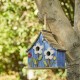 Glitzhome 10.5"H Distressed Solid Wood Birdhouse with 3D Flowers