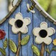 Glitzhome 10.5"H Distressed Solid Wood Birdhouse with 3D Flowers