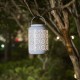 Glitzhome 8.75"H White Metal Cutout Flower Solar Powered Outdoor Hanging Lantern with LED Light