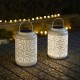 Glitzhome 8.75"H White Metal Cutout Flower Solar Powered Outdoor Hanging Lantern with LED Light