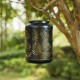 Glitzhome 8.75"H Black Metal Cutout Leaf Solar Powered Outdoor Hanging Lantern with LED Light