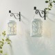 Glitzhome 8.75"H White Metal Cutout Leaf Solar Powered Outdoor Hanging Lantern with LED Light