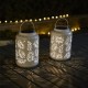 Glitzhome 8.75"H White Metal Cutout Leaf Solar Powered Outdoor Hanging Lantern with LED Light