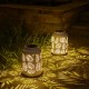 Glitzhome 8.75"H White Metal Cutout Leaf Solar Powered Outdoor Hanging Lantern with LED Light