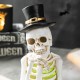 Glitzhome 10.25"H Halloween Lighted Resin Skull Reading Book Table Decor