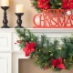 Glitzhome 3ft Pre-Lit Greenery Pine Poinsettia and Red Berries Christmas Swag with 50 Warm White Lights and Timer