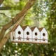 Glitzhome 17"L Washed White Distressed Solid Wood 4-Room Villa Garden Birdhouse with Perch (KD)