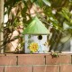 Glitzhome 11"H Stylish Distressed Metal Cottage Decorative Birdhouse with a Cluster of 3D Flowers and Butterfly