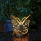 Glitzhome 9"L Black and Gold Metal Cutout Flying Butterfly Silhouette Solar Powdered Edison Bulb Outdoor Lantern.
