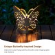 Glitzhome 9"L Black and Gold Metal Cutout Flying Butterfly Silhouette Solar Powdered Edison Bulb Outdoor Lantern.
