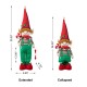 Glitzhome 39"/26"H Telescoped Fabric Christmas Boy Elf Standing Décor