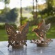 Glitzhome 9.75"H Set of 2 Black and Gold Metal Cutout Flying Hummingbird Silhouette Solar Powered Edison Bulb Outdoor Lantern