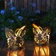 Glitzhome 9"L  Set of 2 Black and Gold Metal Cutout Flying Butterfly Silhouette Solar Powdered Edison Bulb Outdoor Lantern.