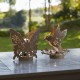 Glitzhome 9"L  Set of 2 Black and Gold Metal Cutout Flying Butterfly Silhouette Solar Powdered Edison Bulb Outdoor Lantern.