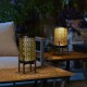 Glitzhome 14.25"H Set of 2 Black and Gold Metal Cutout Flower Pattern Solar Powered LED Outdoor Lantern with Stand