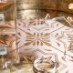 Glitzhome Set of 2 Round Gold Abstract Mirrored Trays with Handles