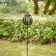 Glitzhome 32.25"H Black Metal Stripes Solar Powered Outdoor Lantern with Edison Bulb and Stake (KD)