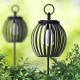 Glitzhome 32.25"H Black Metal Stripes Solar Powered Outdoor Lantern with Edison Bulb and Stake (KD)