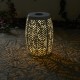Glitzhome 18.25"H Multi-Functional White Iron Cutout Leaf Pattern Drum Silhouette Solar Powdered Garden Stool or Planter Stand or Accent Table or Lantern