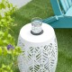 Glitzhome 18.25"H Multi-Functional White Iron Cutout Leaf Pattern Drum Silhouette Solar Powdered Garden Stool or Planter Stand or Accent Table or Lantern