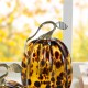 Glitzhome 7.75"H Amber Dots Glass Pumpkin