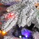 Glitzhome 9ft Pre-Lit Flocked Full Fir Artificial Christmas Tree with 650 Warm White/Multicolor LED Lights, 9 Function w/Foot Pedal, Simple Setup
