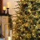Glitzhome 7.5ft Pre-Lit Green Full Fir Artificial Christmas Tree with 1600 Warm White/Multi-color Horse Race LED Lights, 9 Function w/Foot Pedal and Remote Control, Simple Setup