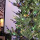 Glitzhome 7.5ft Pre-Lit Green Upward Slim Fir Artificial Christmas Tree with 500 Warm White and Multi-color LED lights, 9 funciton w/ Foot Pedal and Remote Control