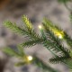 Glitzhome 7.5ft Pre-Lit Green Upward Slim Fir Artificial Christmas Tree with 500 Warm White and Multi-color LED lights, 9 funciton w/ Foot Pedal and Remote Control