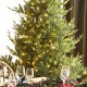 Glitzhome 9ft Pre-Lit Green Upward Slim Fir Artificial Christmas Tree with 700 Warm White and Multi-color LED Lights, 9 funciton w/ Foot Pedal and Remote Control, Simple Setup