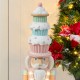 Glitzhome 28"H Lighted Macaron Pink and Blue Resin Christmas Cupcake Nutcracker Porch Decor w/Timer