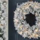 Glitzhome 24"D Pre-Lit Snow Flocked Greenery Pine Christmas Wreath,with 50 White/Multi-color C3 Clear LED Lights and Timer,8 Function