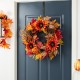 Glitzhome 24"D Fall Sunflower, Pinecone and Berry Wreath Includes a Complimentary Black Metal Wreath Hanger