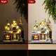 Glitzhome 10.25"H Lighted Christmas Donuts & Coffee Shop Resin Village with Movement and Music