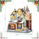 Glitzhome 10.25"H Lighted Christmas Donuts & Coffee Shop Resin Village with Movement and Music