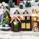 Glitzhome 16"H Christmas Oversized Resin Lighted Musical Skiing Table Village Decor