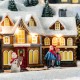 Glitzhome 16"H Christmas Oversized Resin Lighted Musical Skiing Table Village Decor