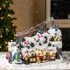 Glitzhome 16"H Christmas Oversized Resin Lighted Musical Skiing Table Village Decor